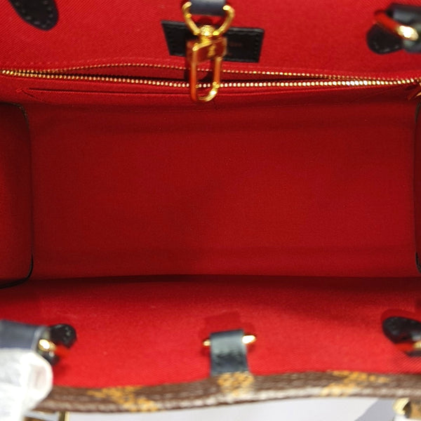 ONTHEGO MM Monogram Coated Canvas Brown