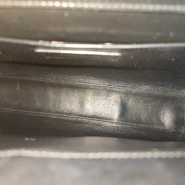Authenticated pre-owned MANHATTAN Calfskin Black - Top Handle Bag at Looply