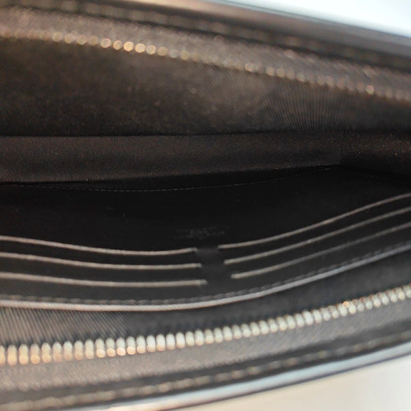 Pochette Voyag MM Monogram Coated Canvas Black