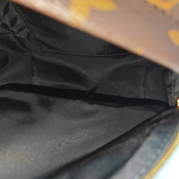 Authenticated pre-owned PALM SPRINGS Mini Monogram Coated Canvas Brown - Backpack at Looply