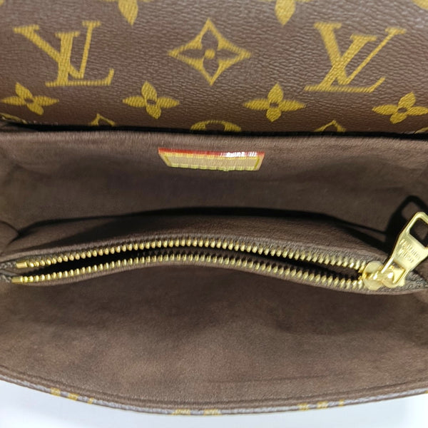 MÉTIS EAST WEST Monogram Coated Canvas Brown