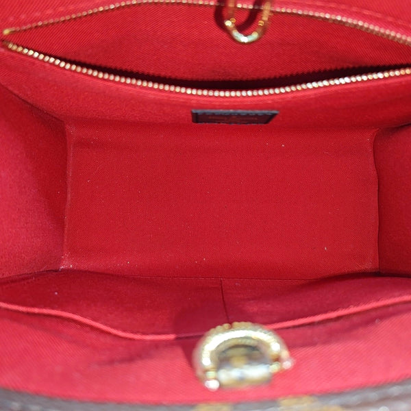 ONTHEGO PM Monogram Coated Canvas Brown