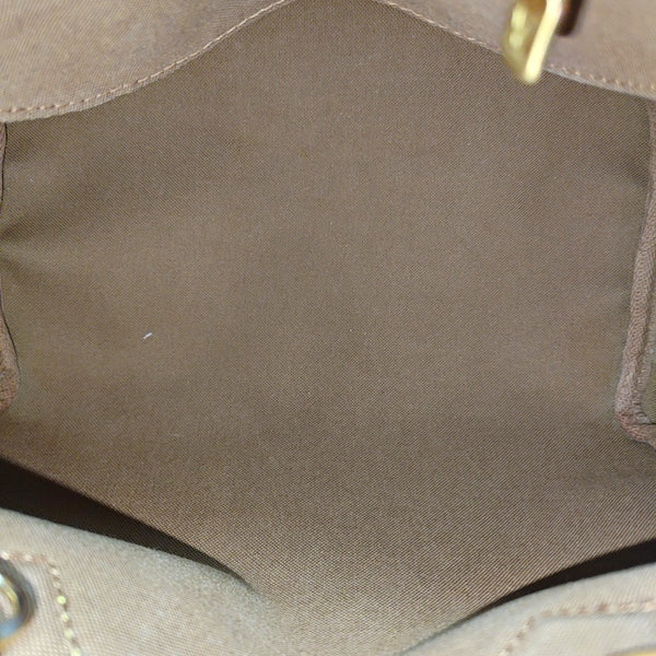 SPEEDY 25 Monogram Coated Canvas Brown