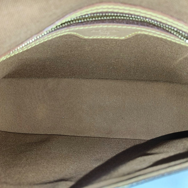 LOOPING PM Monogram Coated Canvas Brown