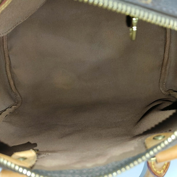 SPEEDY 25 Monogram Coated Canvas Brown