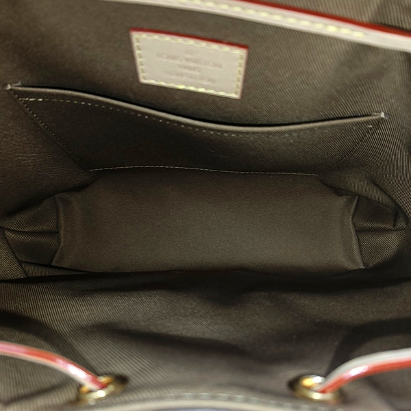 EXCURSION PM Monogram Coated Canvas Brown