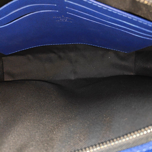 Pochette Voyag MM Monogram Coated Canvas Blue
