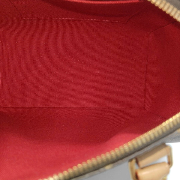 SPEEDY 20 Monogram Coated Canvas Brown