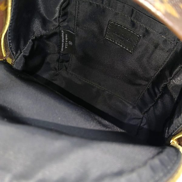 Authenticated pre-owned PALM SPRINGS Mini Monogram Coated Canvas Brown - Backpack at Looply