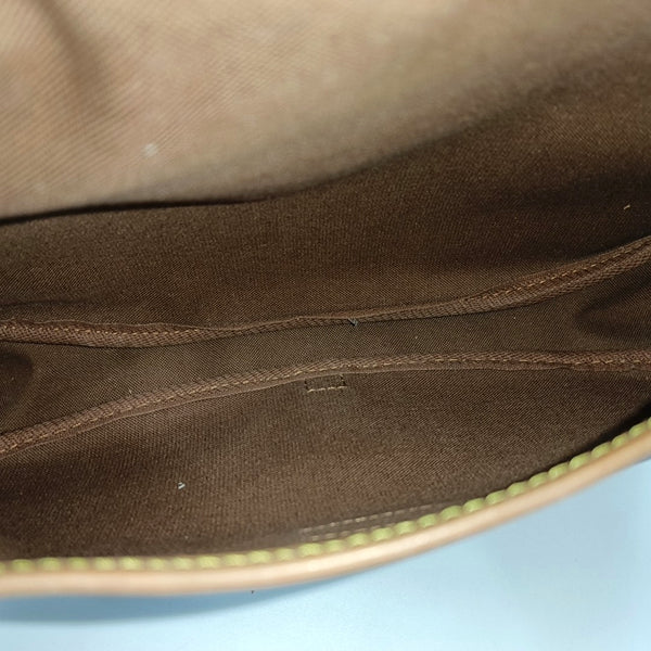 SAUMUR 30 Monogram Coated Canvas Brown