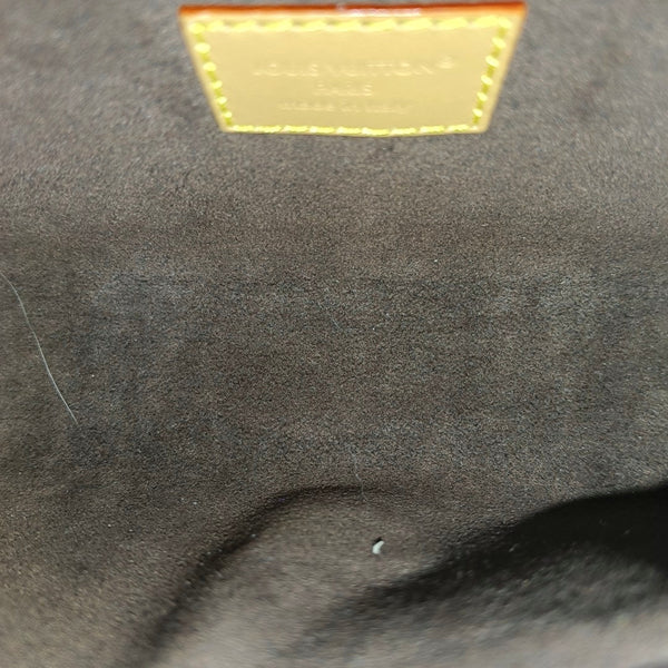 Pochette Camille Monogram Coated Canvas Brown