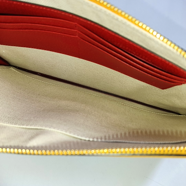 Monogram Coated Canvas Clutch Beige
