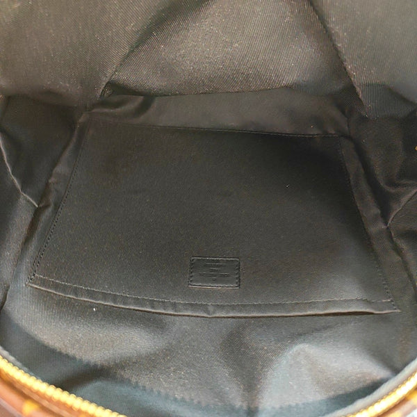 Monogram Coated Canvas Backpack Brown