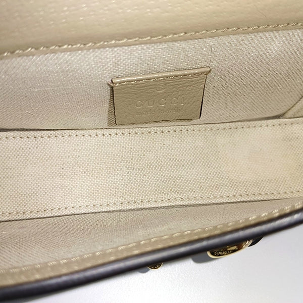 Authenticated pre-owned Horsebit 1955 Mini Monogram Coated Canvas White - Shoulder Bag at Looply