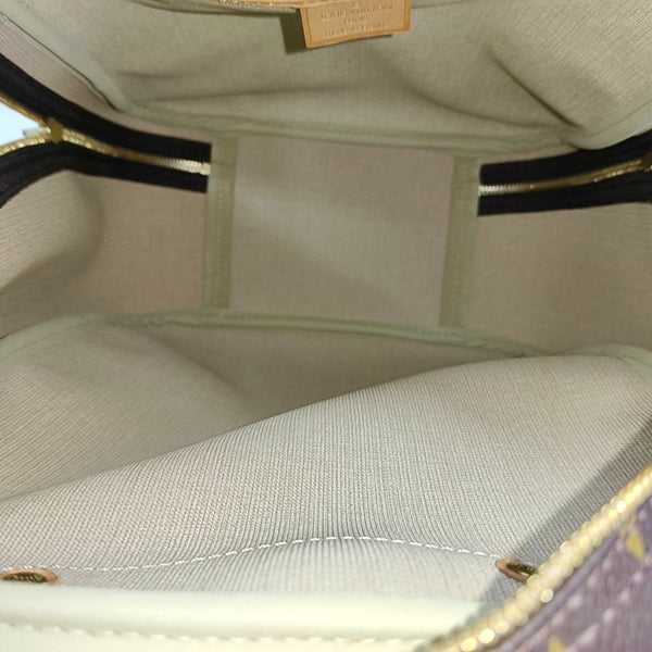 EXCURSION Monogram Coated Canvas Brown