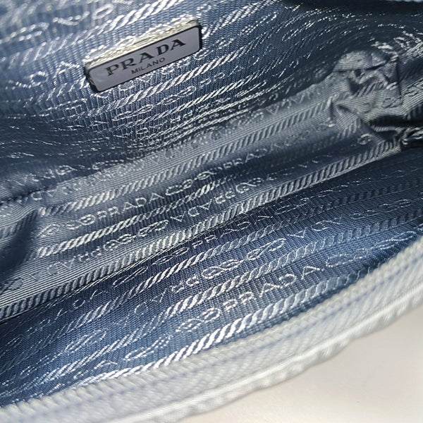 Authenticated pre-owned Re-Edition2000 Nylon Blue - Top Handle Bag at Looply