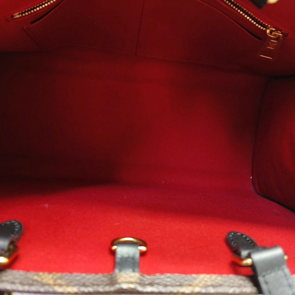 ONTHEGO MM Monogram Coated Canvas Brown