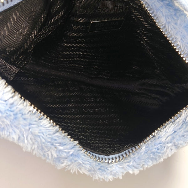Authenticated pre-owned Re-Edition2000 Mini Terry Cloth Blue - Top Handle Bag at Looply