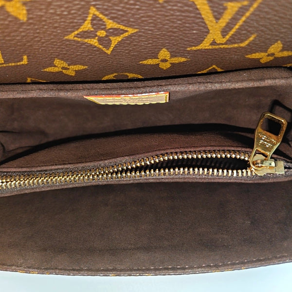 MÉTIS EAST WEST Monogram Coated Canvas Brown