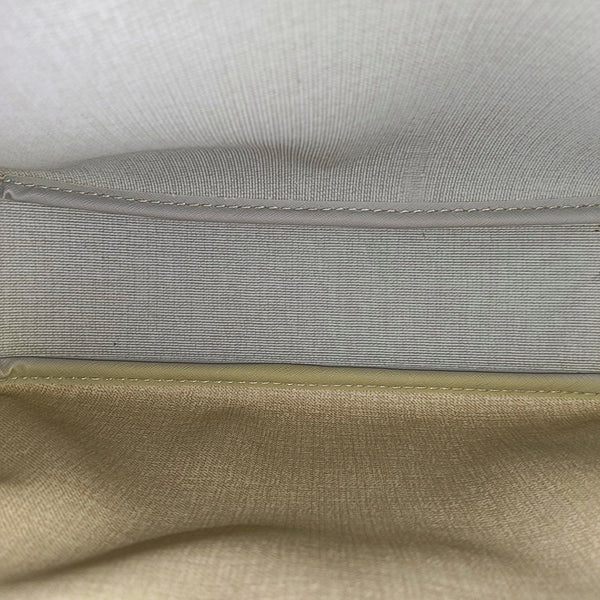REPORTER PM Monogram Coated Canvas Brown