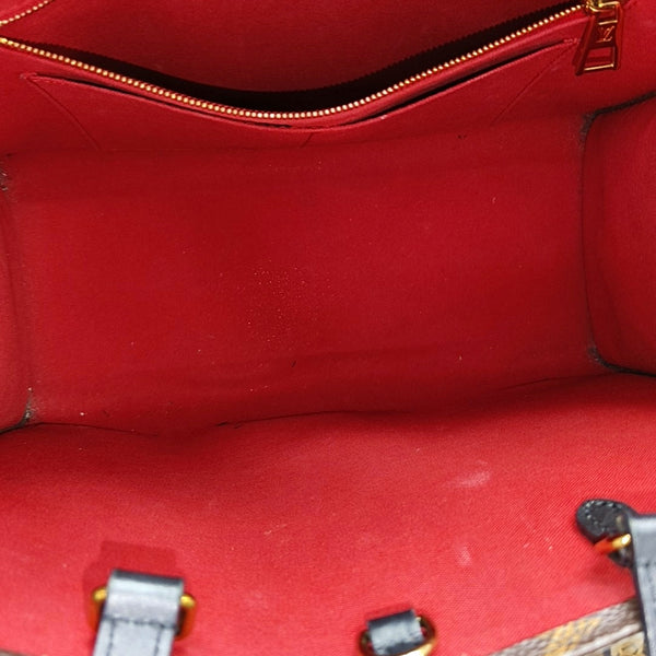 ONTHEGO MM Monogram Coated Canvas Brown