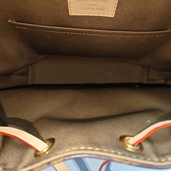 EXCURSION PM Monogram Coated Canvas Brown