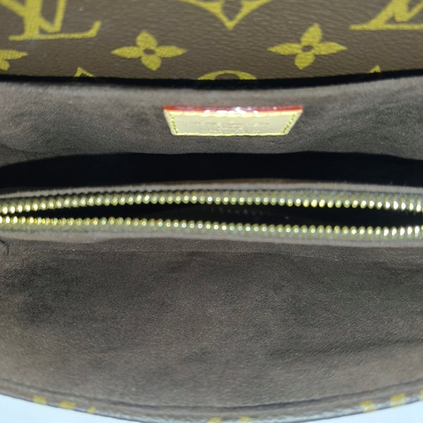 MÉTIS EAST WEST Monogram Coated Canvas Brown