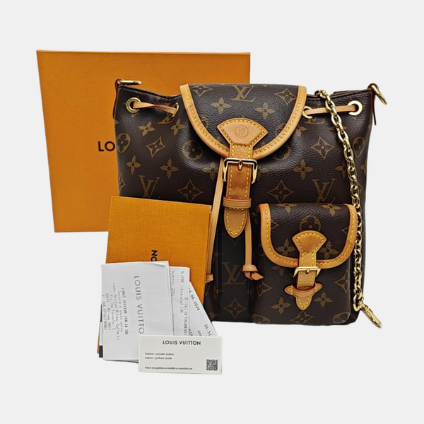 EXCURSION PM Monogram Coated Canvas Brown
