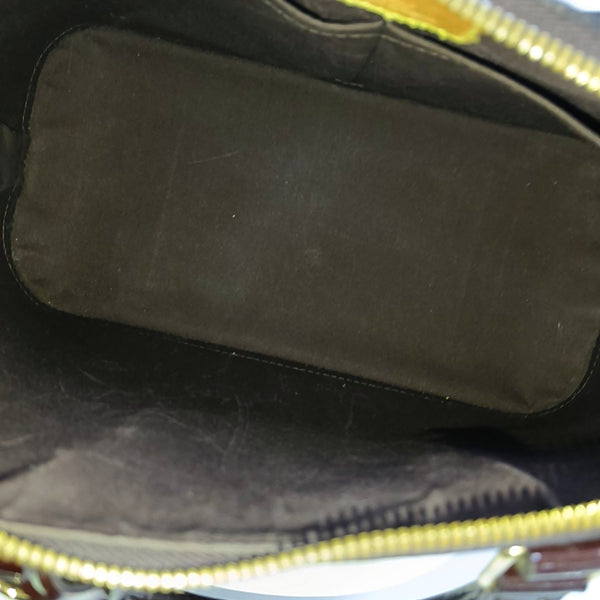Authenticated pre-owned ALMA PM Monogram Patent Leather Burgundy - Top Handle Bag at Looply