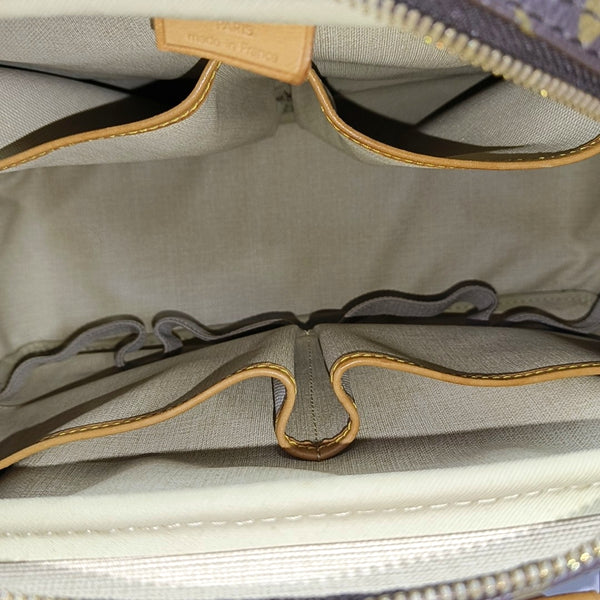 DEAUVILLE Monogram Coated Canvas Brown