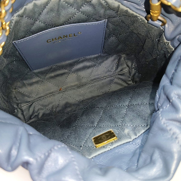 Authenticated pre-owned CHANEL 22 Mini Quilted Calfskin Blue - Bucket Bag at Looply
