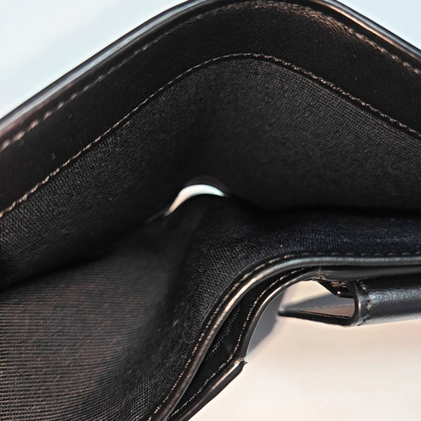 Monedero de cuero negro TRIOMPHE CANVAS