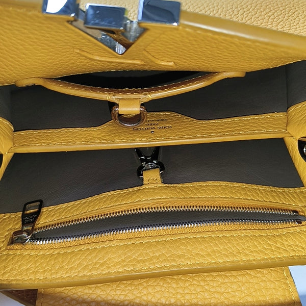 Authenticated pre-owned CAPUCINES BB Calfskin Orange - Shoulder Bag at Looply