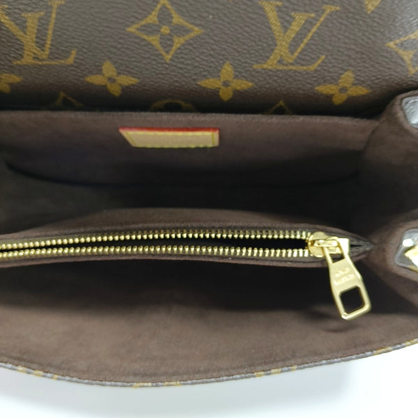 MÉTIS EAST WEST Monogram Coated Canvas Brown