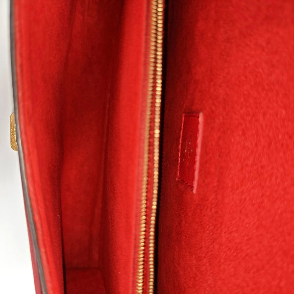 VICTOIRE Monogram Coated Canvas Brown