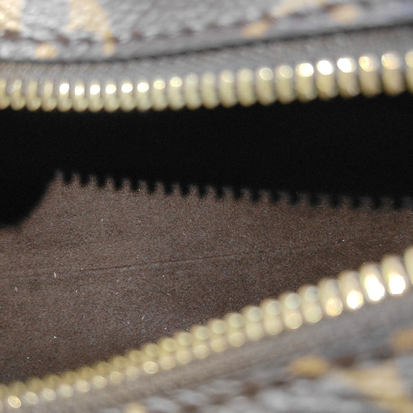 SIDE TRUNK PM Monogram Coated Canvas Brown