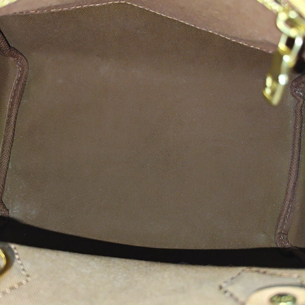 SPEEDY 25 Monogram Coated Canvas Brown