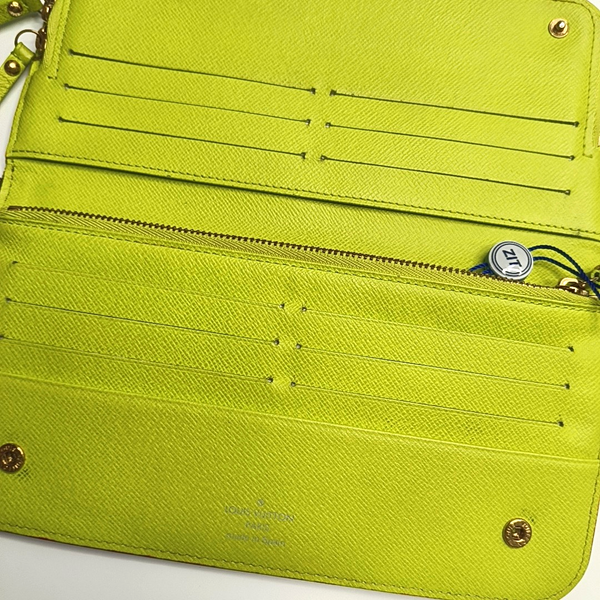 Cartera negra Insolite Monogram de lona revestida