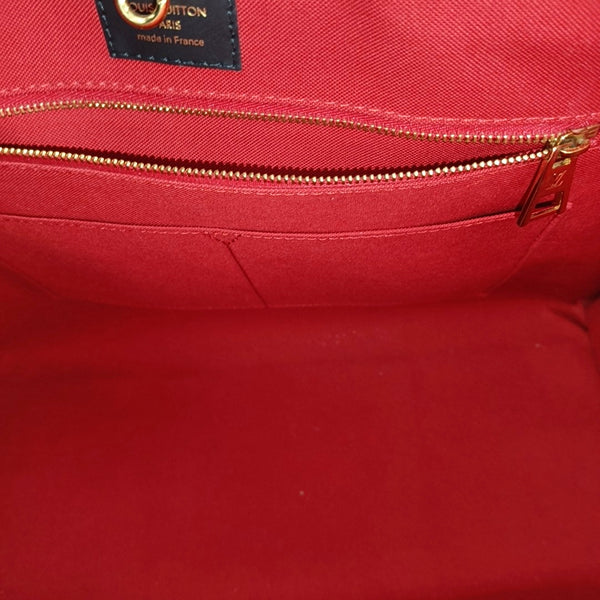 ONTHEGO GM Monogram Coated Canvas Brown