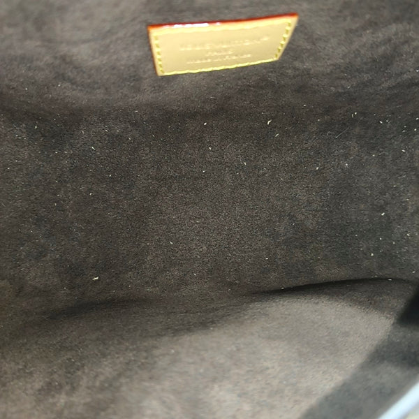 Pochette Mia Monogram Coated Canvas Brown