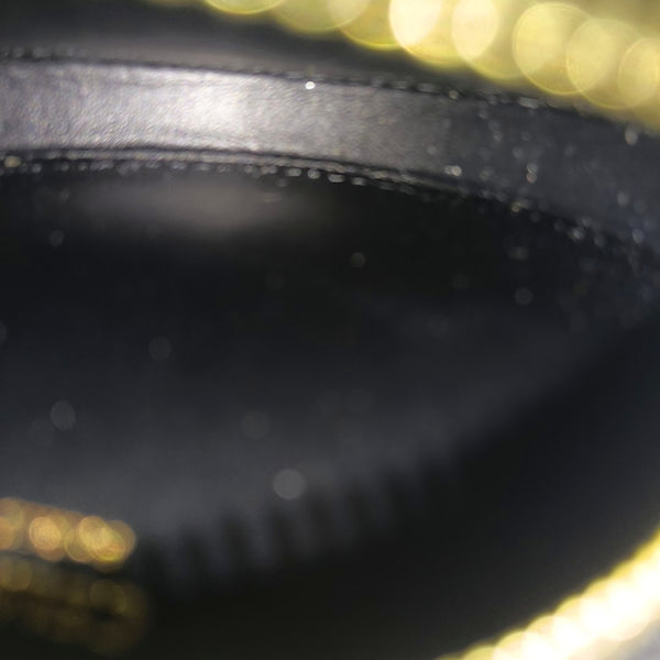 Authenticated pre-owned TRIOMPHE CANVAS Leather Black - Clutch at Looply