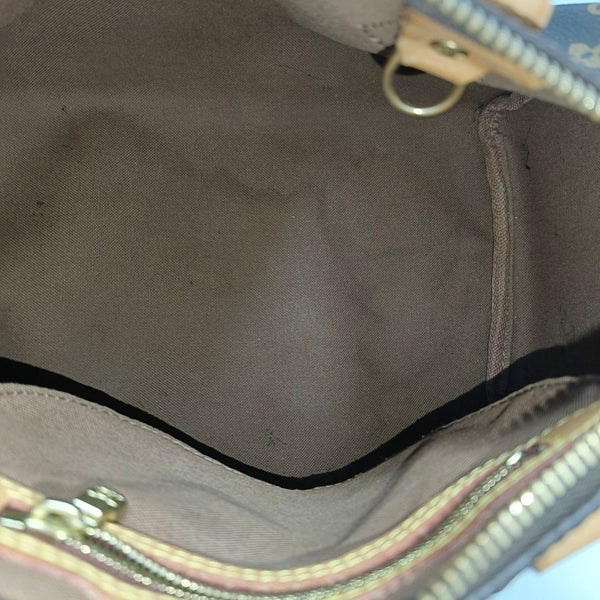 SPEEDY 25 Monogram Coated Canvas Brown