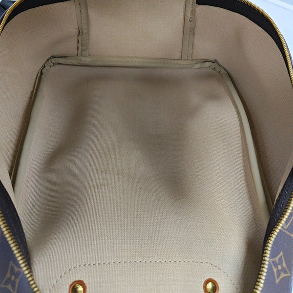 EXCURSION Monogram Coated Canvas Brown