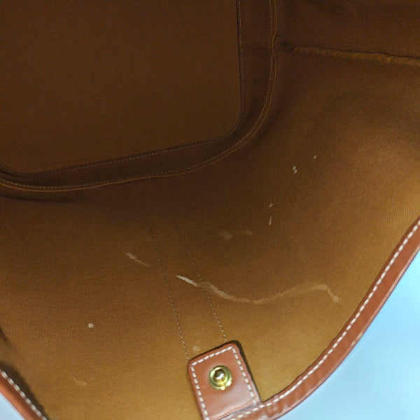 Authenticated pre-owned TRIOMPHE CANVAS Medium Coated Canvas Brown - Bucket Bag at Looply