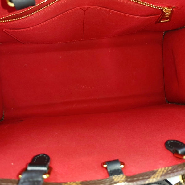 ONTHEGO MM Monogram Coated Canvas Brown