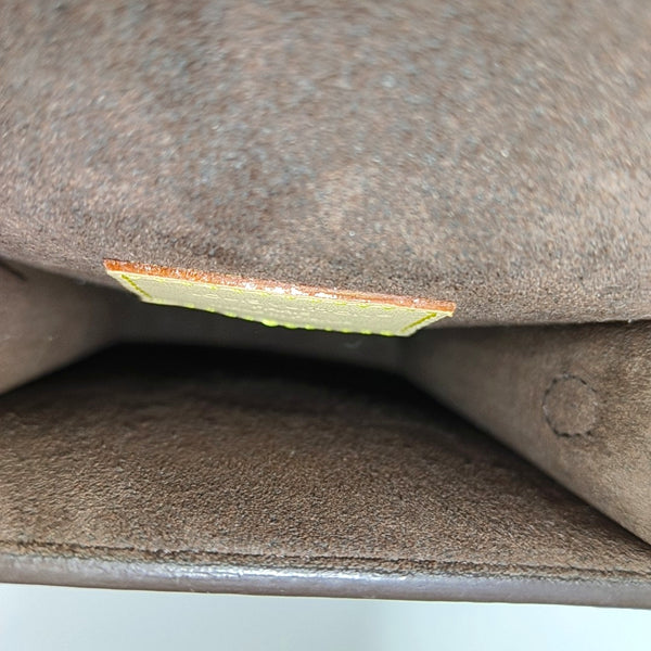 MÉTIS Monogram Coated Canvas Brown