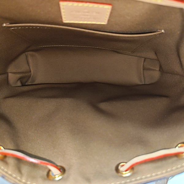 EXCURSION PM Monogram Coated Canvas Brown