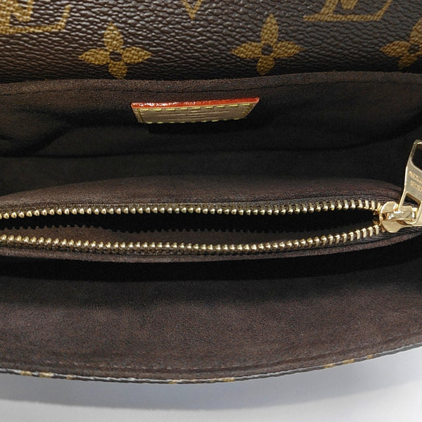 MÉTIS EAST WEST Monogram Coated Canvas Brown