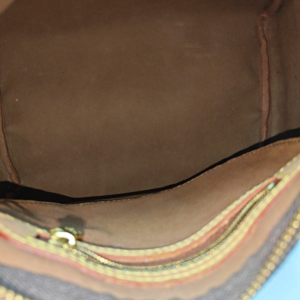 SPEEDY 25 Monogram Coated Canvas Brown