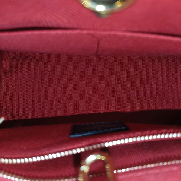 ONTHEGO PM Monogram Coated Canvas Brown